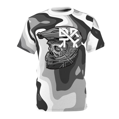 This image showcases a T-shirt with our offroad cyber skull helmet design on a camouflage pattern. The shirt features a stylized offroad helmet adorned with the letters “DRTYX.” The overall design is set against a grey and black camouflage background, creating a fashionable and urban look.