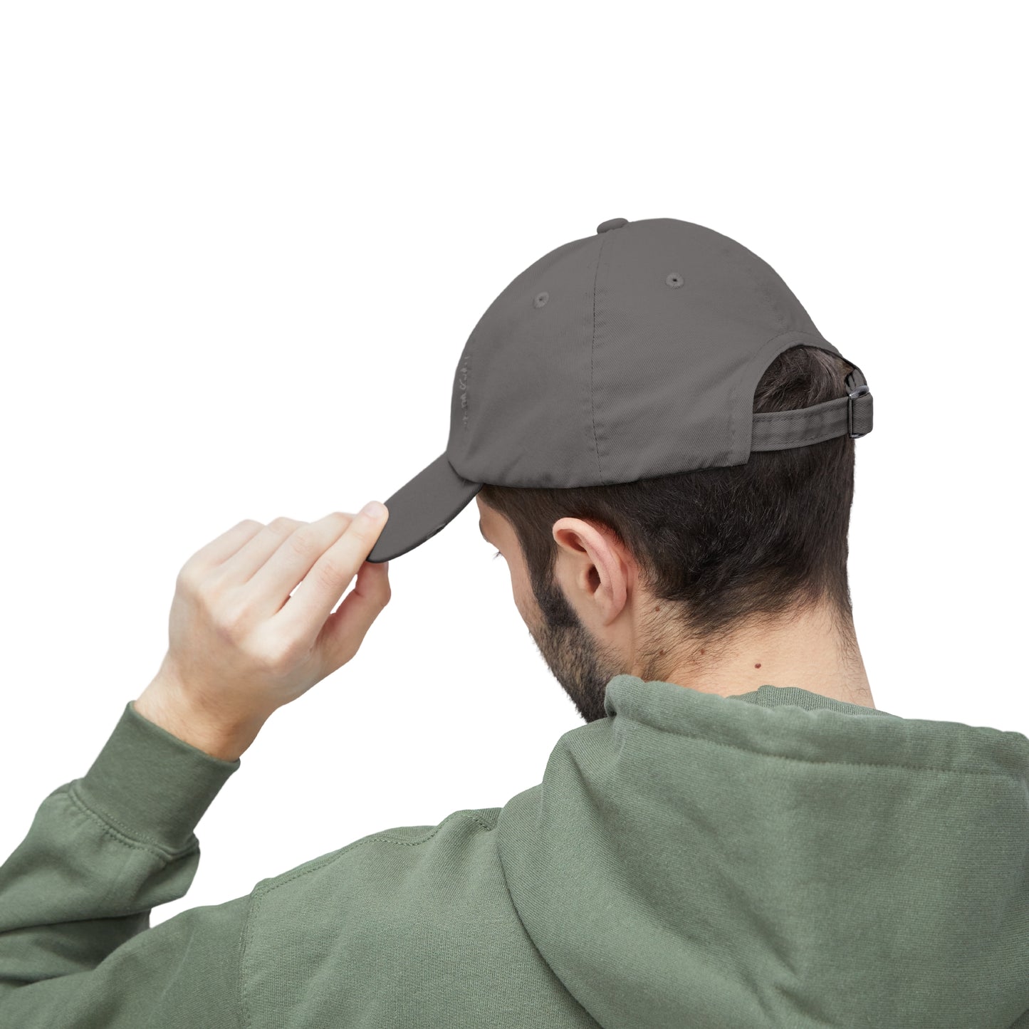 This image showcases the back view of a man wearing a hat and the adjustment strap.