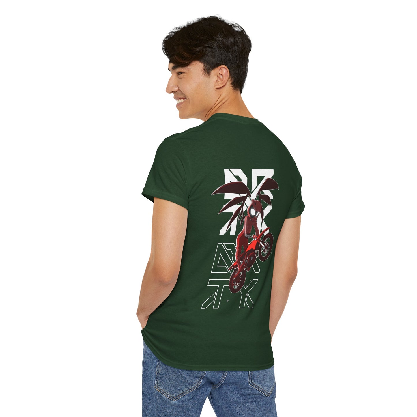 This image showcases a man standing with the back view of a T-shirt with a winged rider with a dress and cartoon eyes in a helmet jumping a dirt bike over the DRTY X logo.