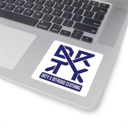 This image shows a small square DRTY X Logo sticker on a laptop background.